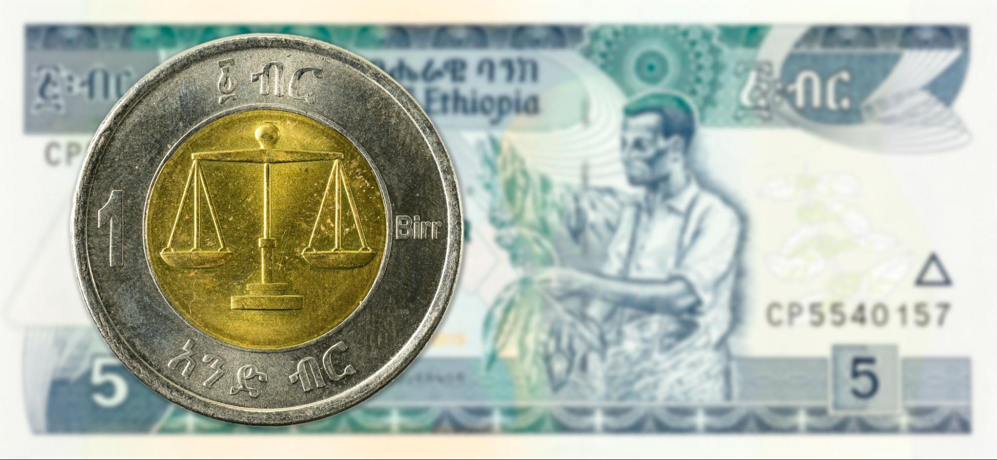 1 birr coin against 5 ethiopian birr bank note obverse