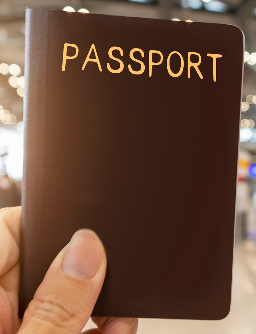 A Passport On Hand