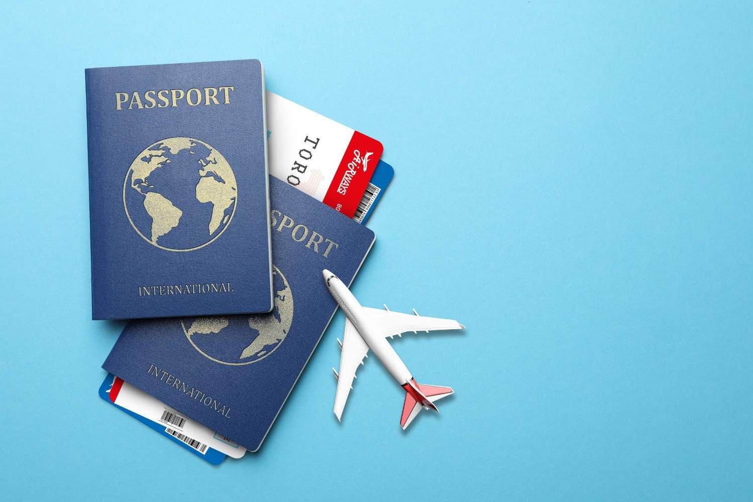 Passports Boarding Passes And Airplane