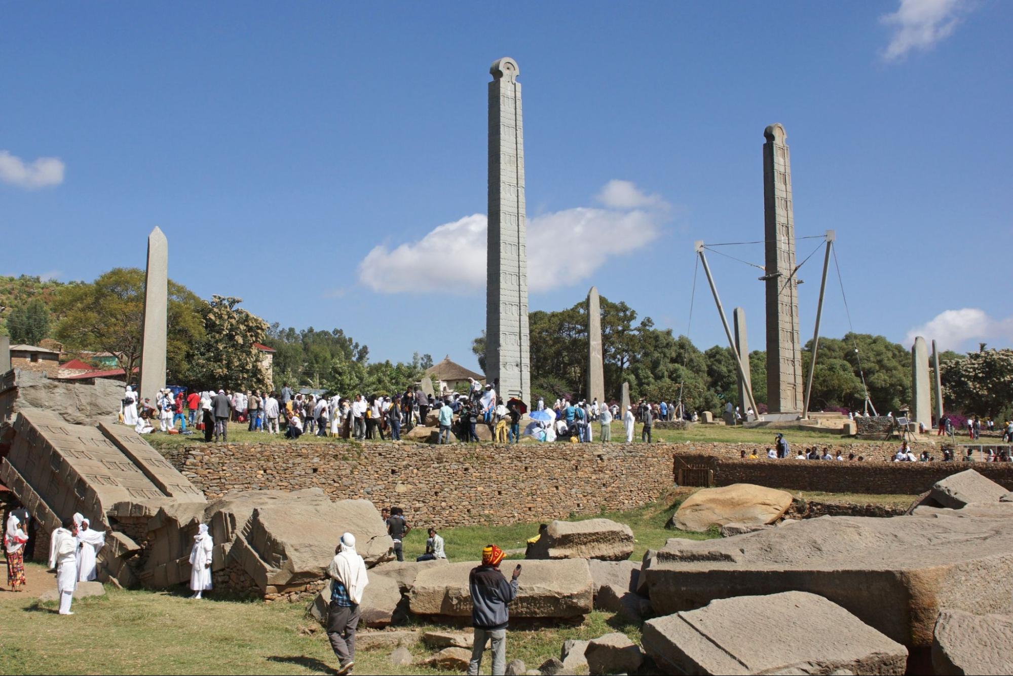 People visiting the ancient steles of Axum During The Hidar Zion Ceremony in Ethiopia, Africa