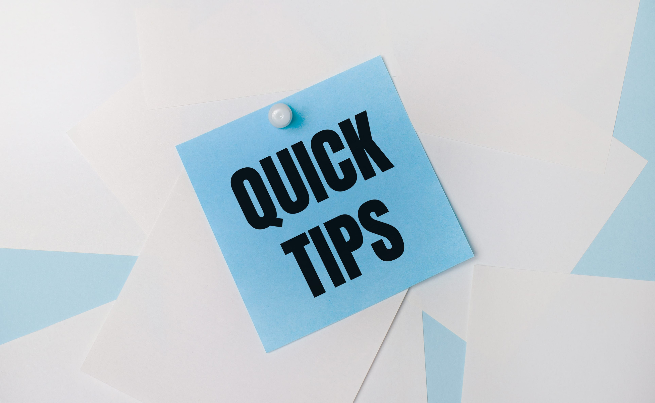 Quick Tips Text Written On A Blue Square Sticker