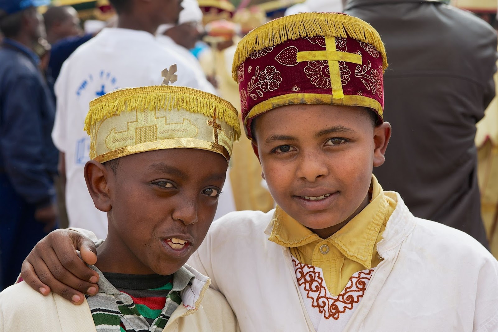 Ethiopian boys wearing traditional costumes during Timkat Christian Orthodox religious celebrations
