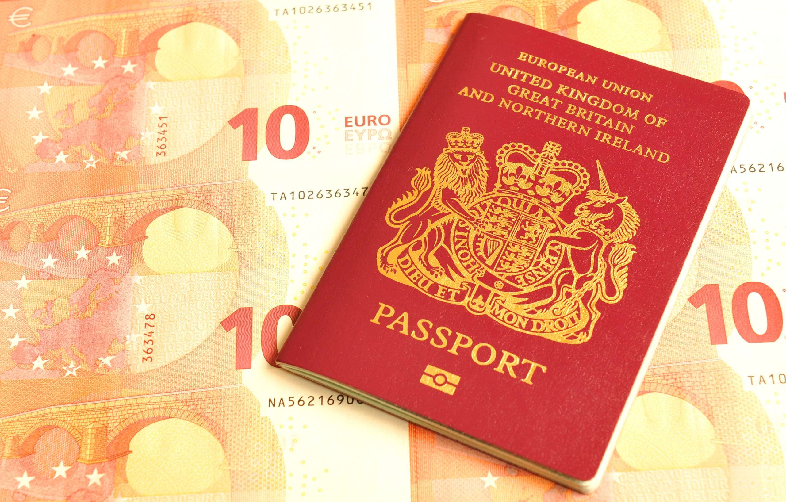 Uk In Euro Zone Concept With British Passport And Euro Banknotes